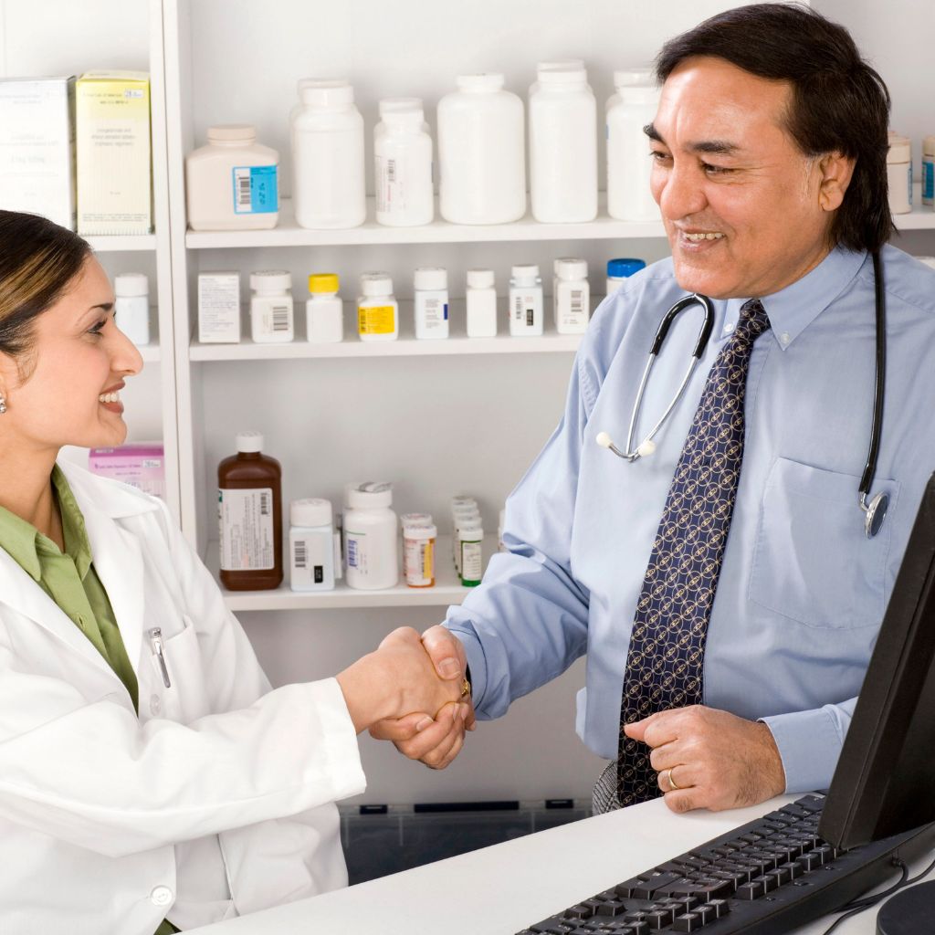 Doctor and Pharmacist Shaking Hands