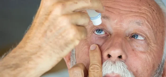 Eye Drop Man 1024 Man putting in eye drops